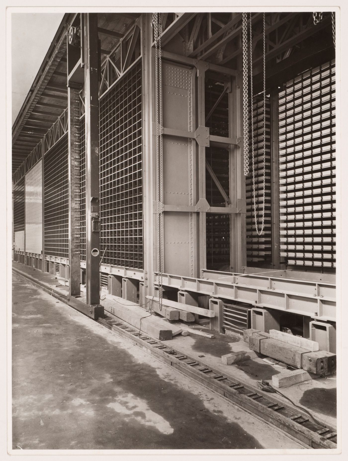 Interior view of the Central Social Insurance Institution showing construction on card catalog drawers and mobile work stations, Prague, Czechoslovakia (now Czech Republic)