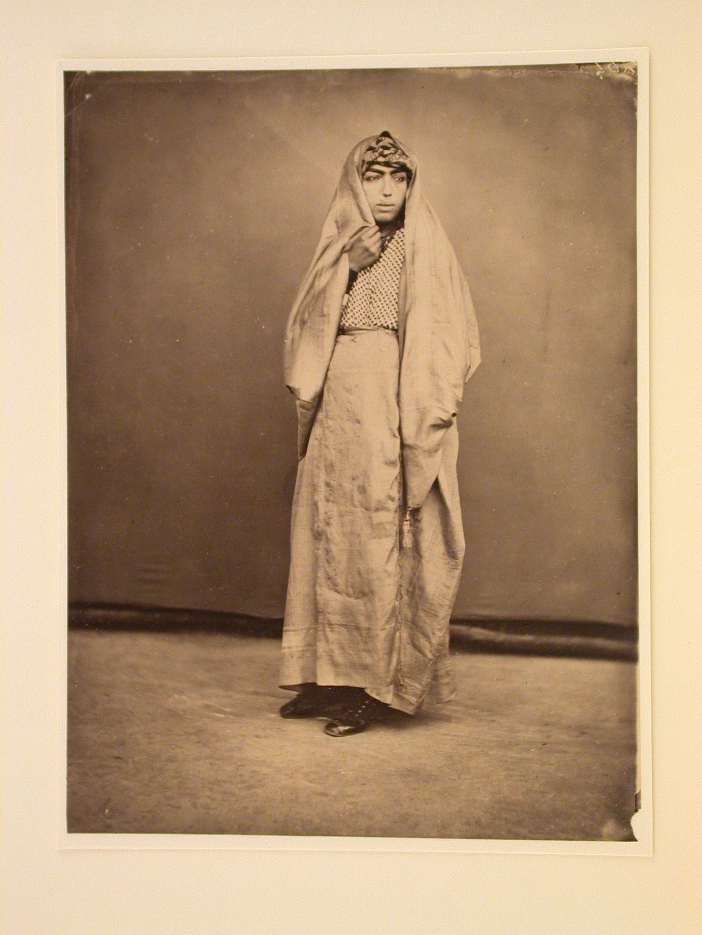 Studio portrait of a woman standing, Eastern Mediterranean