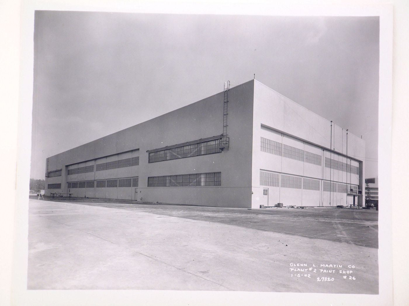 View of the principal [?] and lateral façades of the Paint Shop, Glenn L. Martin Company Navy Assembly Plant No. 2, Middle River, Maryland