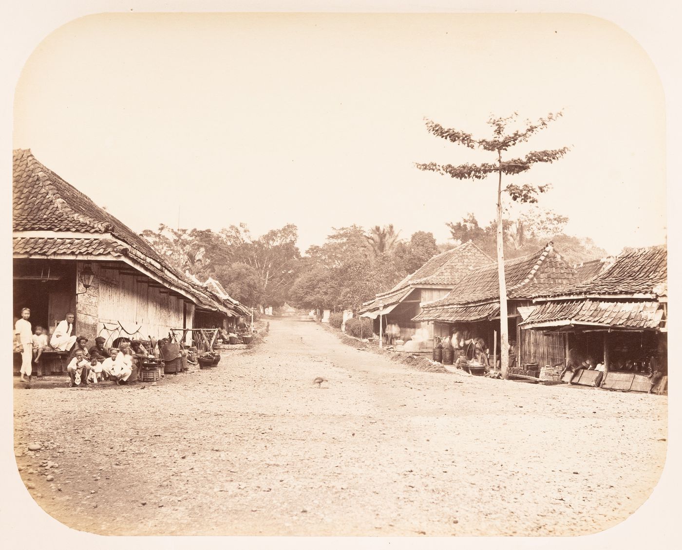 View of a street showing stores and people, Tjiandjur (now Cianjur), Dutch East Indies (now Indonesia)