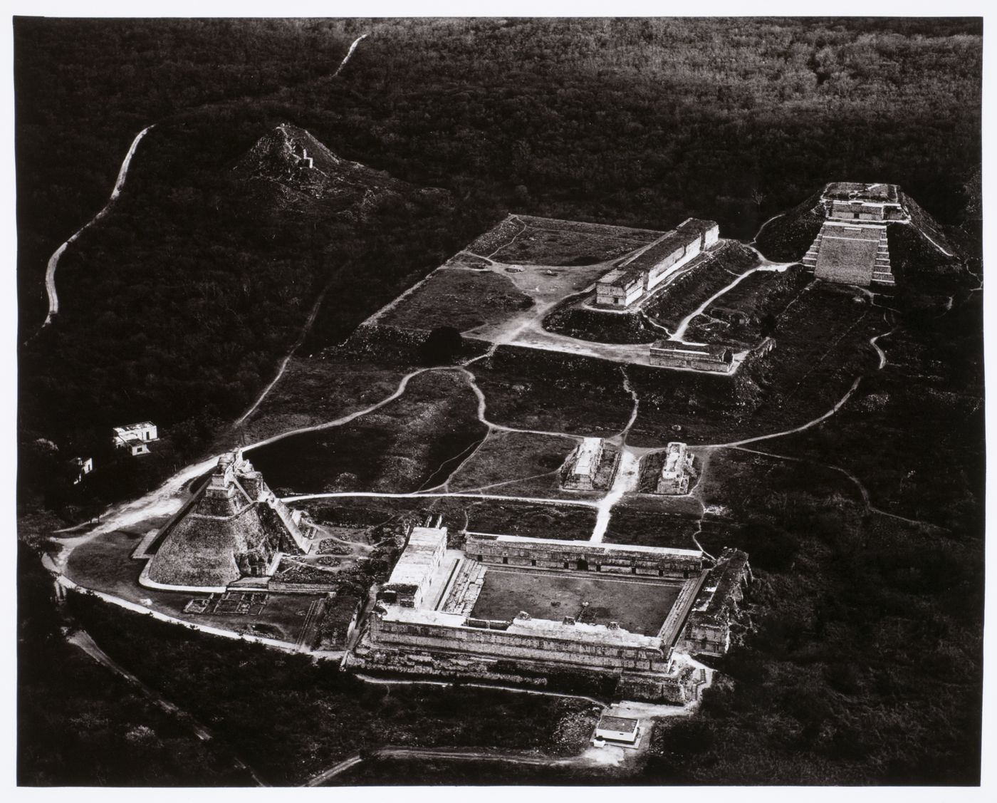 Aerial view of Uxmal Site showing the Nunnery Quadrangle, Pyramid of the Magician, Ballcourt, House of Turtles, Palace of the Governor and the Great Pyramid, Yucatán, Mexico