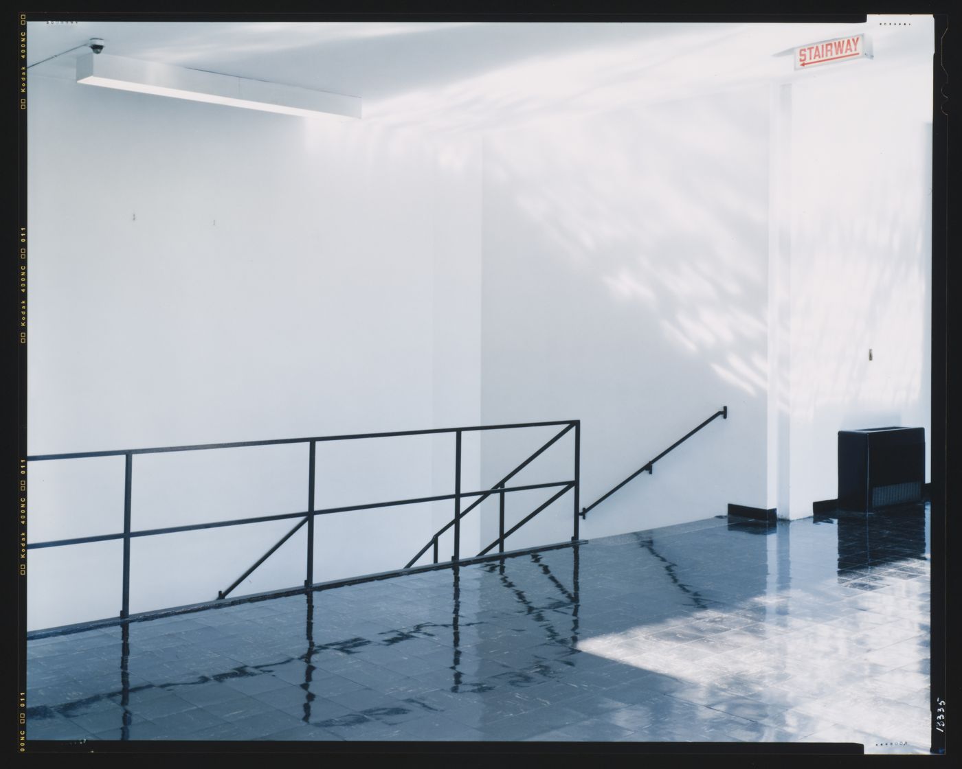 Interior view of a stairwell and landing in Perlstein Hall, Illinois Institute of Technology, Chicago, Illinois